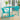 3 Piece Bistro Set Image. 3 Piece outdoor furniture set in Matte Teal Finish with Modern Slat Paneling and Oval Table in an outdoor setting.