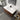 White sink and dark walnut wood