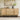 Minimalist Sideboard Image. Wood Sideboard with 2 Beveled Drawers, 2 Cabinets and Cord Management Cutout in Natural Wood Finish
