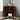 a triangular cabinet image, showcasing two doors that opens to reveal a single adjustable shelf