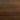a plain wood image in a dark-brown finish of a triangular cabinet