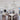 A Flush Mount Caged Ceiling Fan image. It ia hanged over a dining table