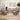 3 Piece Outdoor Furniture Set Image. Cushioned Swivel Patio Chairs with Glass Top Coffee Table in an outdoor setting.