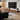a floating TV stand image, featuring doors and drawers to conceal your media devices