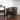 A brown leather accent chair in a modern living room