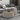 Modern Round Coffee Table with Hidden Drawers