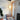 Pear Shaped plug in wall sconces variant illuminating a cozy reading nook