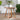 a round dining patio table image, featuring a slat top and A-frame legs