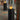 Pair of modern fire columns with glass cylinders in indoor hallway