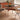 a round dining table paired with 2 dining chairs