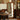 Solid cherry wood wavy floor mirror in vintage-style living room