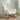 Teddy fabric rocking chair in a cozy living room setup with throw blanket