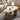 Lamp on three leg coffee table