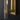 Glass and steel wall sconce