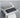 silver toilet paper holder with storage shelf and bathroom accessories
