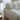 zoomed view of white sofa low arm