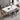 Stone top table set with six chairs