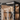 a close-up view of a tall wine cabinet in clear glass 