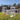 124" White & Gray Outdoor Wooden Chicken Coop with Ventilation Door and Removable Ramp