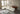 In a living room - our 6-seater sofa, spacious large space and wall art 