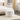 24.41" Ivory Boucle Round Storage Ottoman