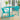 3 Piece Bistro Set Image. 3 Piece outdoor furniture set in Matte Teal Finish with Modern Slat Paneling and Oval Table in an outdoor setting.
