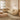 Angled view of the Beige Cloud Sofa in sherpa fleece fabric in a modern living room setting