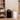 Modern trash bins with swing lids placed in a stylish living room 