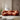 orange rotating sofa