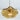 Ceiling mounted amber glass pendant light showing, amber glass floral lamp shade, light bulb, and brass lamp holder