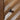 a wood nightstand image, with hand-crafted detailing and a black door knob
