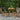 3 Piece Bistro Set Image. 3 Piece outdoor furniture set in Brown and Black with Round Table in foldable design in an outdoor setting