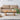 Front view of rectangular wood coffee table with rattan legs
