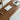 Top view showing wide table top and wood grain of the home office corner desk