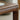 Well polished, rounded edge of home office corner desk