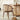 Angled View of the Rattan Dining Table for 4 in a Modern Dining Room Setting