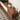 a close-up view of a a mid century modern tv stand image