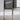 Grey Nightstand Image. A closeup view of the modern minimalist nightstand showcasing its high gloss stainless steel legs