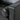 The armrest  of a black leather accent chair 