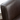 The backrest of a brown leather accent chair