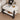 an up-close view of a large nightstand image. It displays various decorative items in the tabletop. 