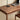 A solid walnut desk showcasing its rich wood grain and built-in drawers for added convenience.