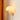 a white plug in wall sconce in a mushroom shape