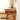 a solid cherry wood desk with a sturdy base in natural finish