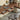a solid wood l shaped desk with two opened drawers for ample storage