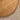 a solid wood round coffee table with vertical textured embossed design