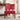 A red leather accent chair in a modern living room