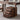 a walnut wood desk with a rolling cabinet that features three drawers