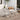 3 Piece Patio Bistro Set Image. 3 piece outdoor furniture set with Foldable Round Table and Chairs in white in an outdoor setting.