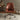 Front View of the Brown Leather Office Chair in a Comfy Indoor Setting